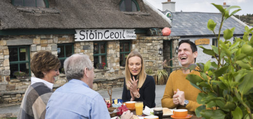 Book Direct & Save - Best Price Guarantee | Save up to 22% with Trident Holiday Homes | People sitting outside a pub in Clontallagh © Toursim Ireland